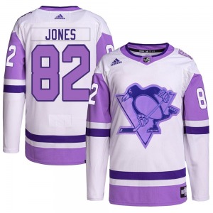 Caleb Jones Pittsburgh Penguins Adidas Youth Authentic Hockey Fights Cancer Primegreen Jersey (White/Purple)